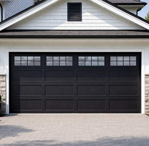 Professional technician repairing a residential garage door