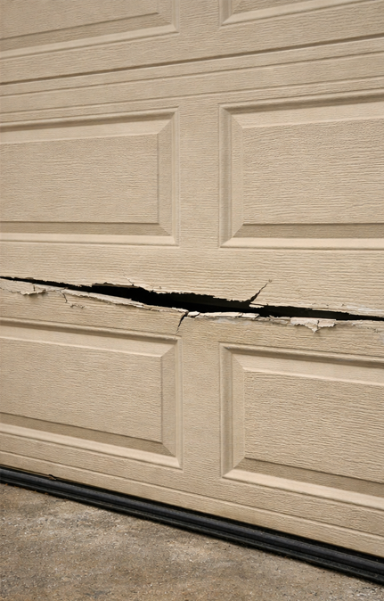 Damaged garage door panels causing imbalance and unsafe operation